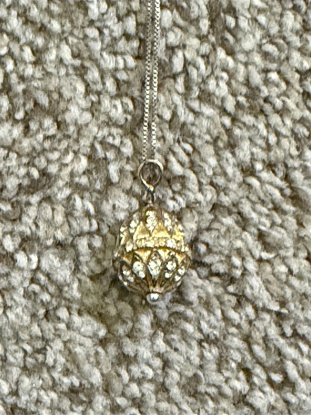 Fabergé Gold-Tone Filigree Egg Pendant Necklace with Crystal Accents